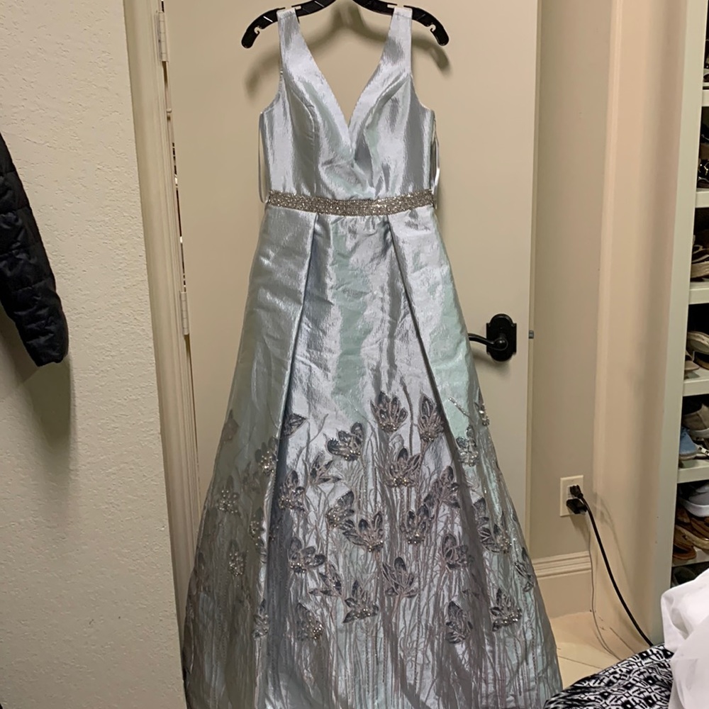 Neiman Marcus stunning silver Gown with beautiful flower beaded flowers